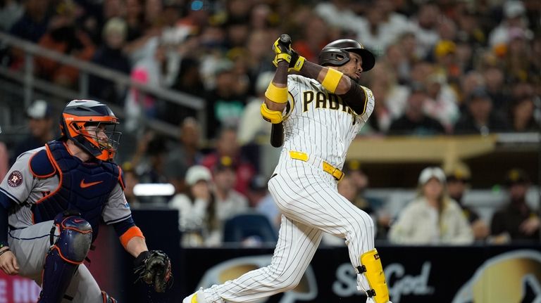 San Diego Padres' Luis Arraez strikes out during the second...