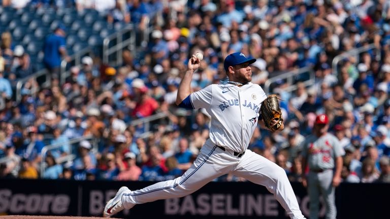 Toronto Blue Jays pitcher Yariel Rodríguez throws against the St....