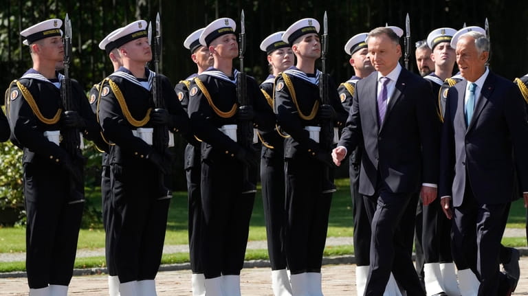 Poland's President Andrzej Duda, second right, and Portuguese President Marcelo...