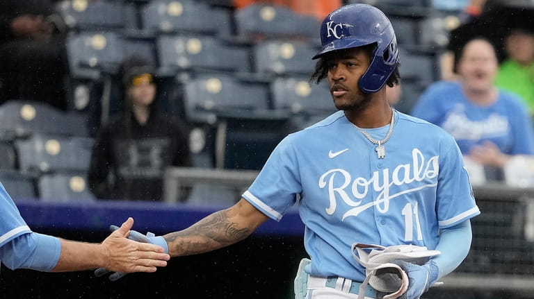 Photo: Royals Matt Quatraro and Brady Singer Shake Hands on