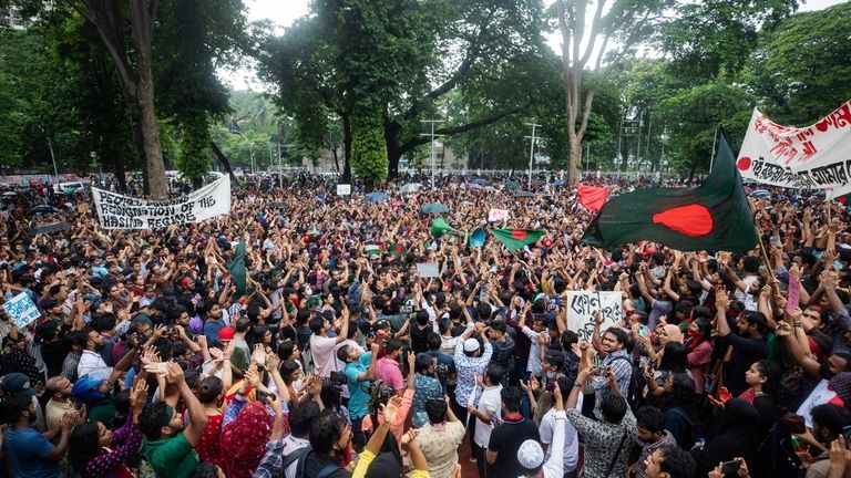 Activists take part in a protest march against Prime Minister...