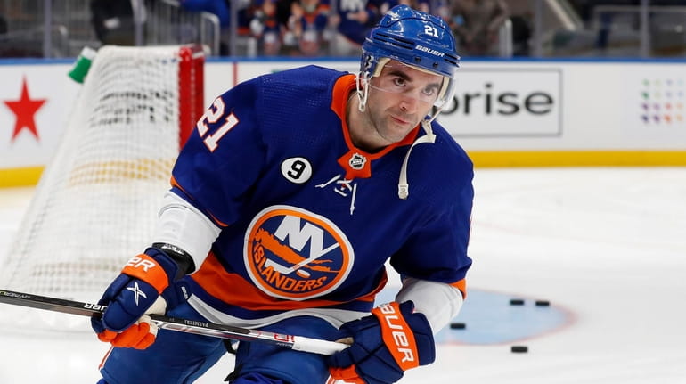 Kyle Palmieri of the Islanders warms up before a game against...