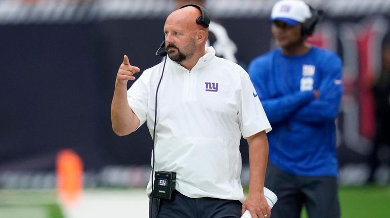 Giants head coach Brian Daboll watches play against the Texans...