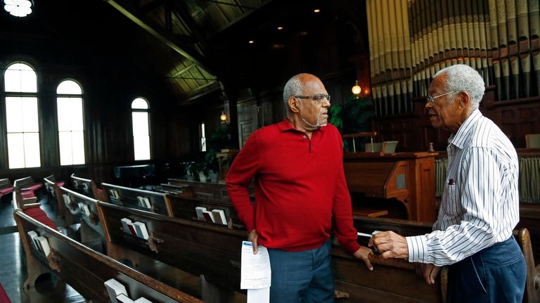 Longtime civil rights activists Robert "Bob" Moses, left, and Hollis...