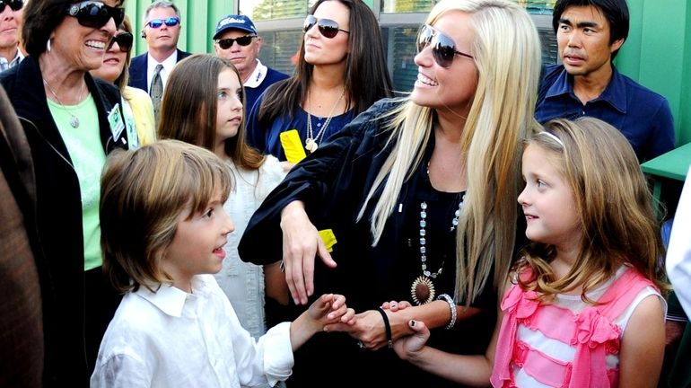 Phil Mickelson's wife Amy, his son Evan, daughter Amanda, and...