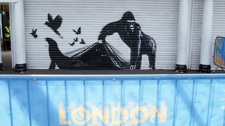 The new artwork unveiled by Banksy at London Zoo, depicting...