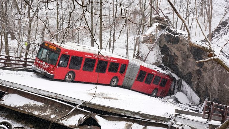 FILE—A Pittsburgh Transit Authority bus sits on the Fern Hollow...