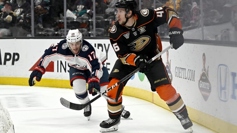 Anaheim Ducks defenseman Ilya Lyubushkin (46) controls the puck with...
