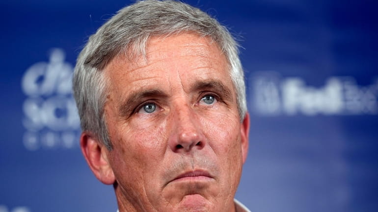 PGA Tour Commissioner Jay Monahan pauses while speaking about the...