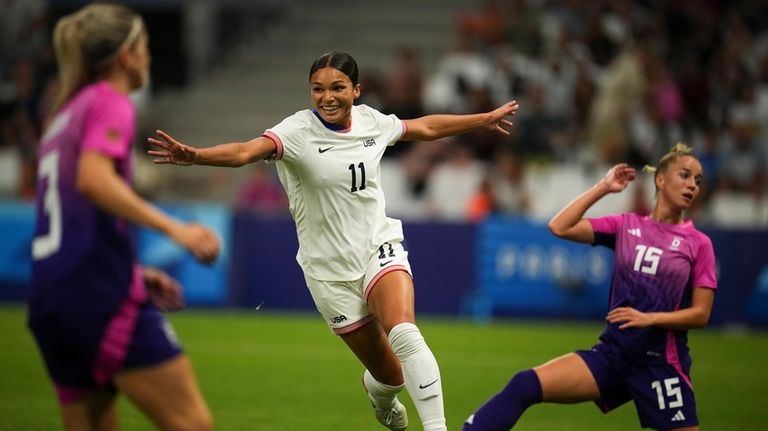 United States' Sophia Smith celebrates after scoring her side's first...