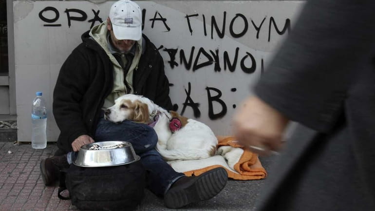 Roberto, an English-Italian who lives in Greece with his dog,...
