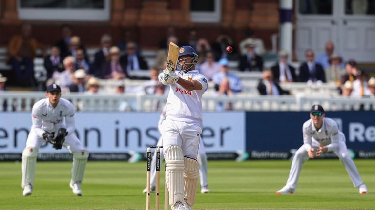 Sri Lanka's Dimuth Karunaratne bats during day four of the...