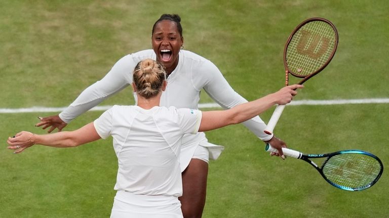 Taylor Townsend, top, of the United States and Katerina Siniakova...