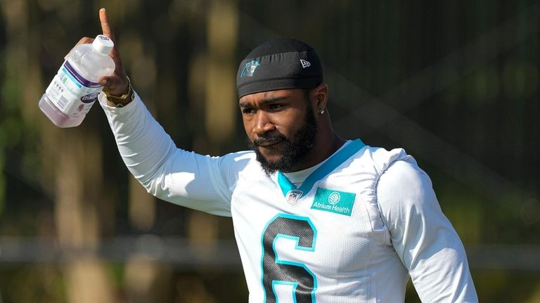 Panthers running back Miles Sanders arrives at training camp on July 26 in...