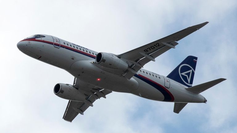 A Russian passenger Sukhoi Superjet 100 plane performs during the...