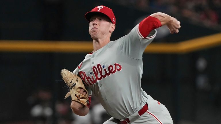 Philadelphia Phillies pitcher Kolby Allard throws against the Arizona Diamondbacks...