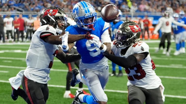 Tampa Bay Buccaneers safety Jordan Whitehead, left, and safety Tykee...