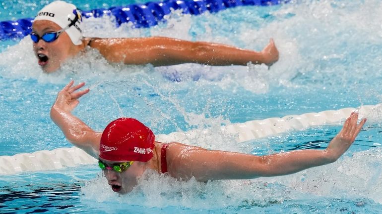 Zhang Yufei, of China, competes during a heat in the...