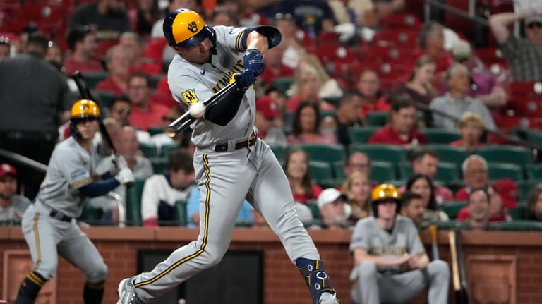 Milwaukee Brewers' Tyrone Taylor hits an RBI double during the...