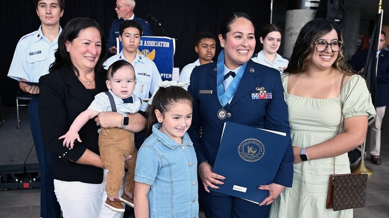 Air Force Sgt. Claudia Barrerio-Kerstiens of Shirley with her mother Ana...