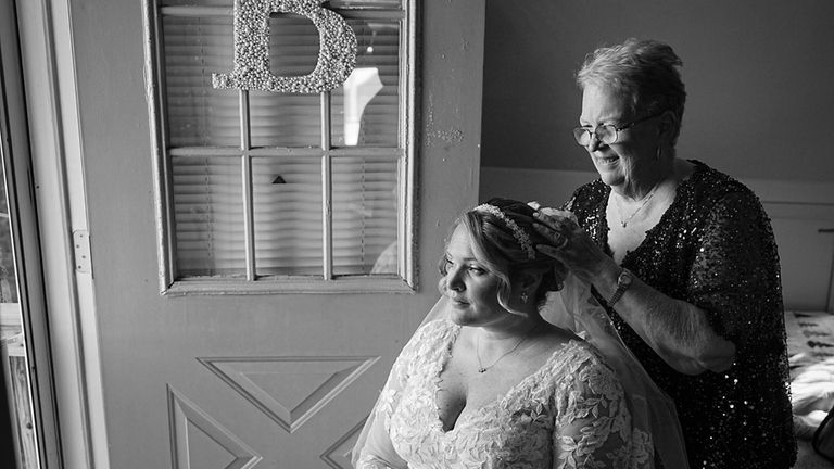 Katieann Albro, center, gets ready to marry Bobby Burns.