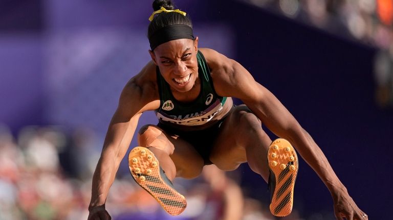 Thea Lafond, of Dominica, makes an attempt in the women's...