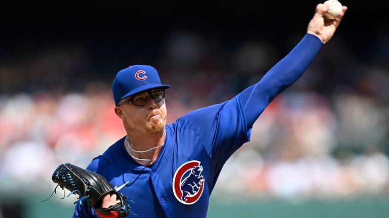 Chicago Cubs starting pitcher Jordan Wicks throws during the second...