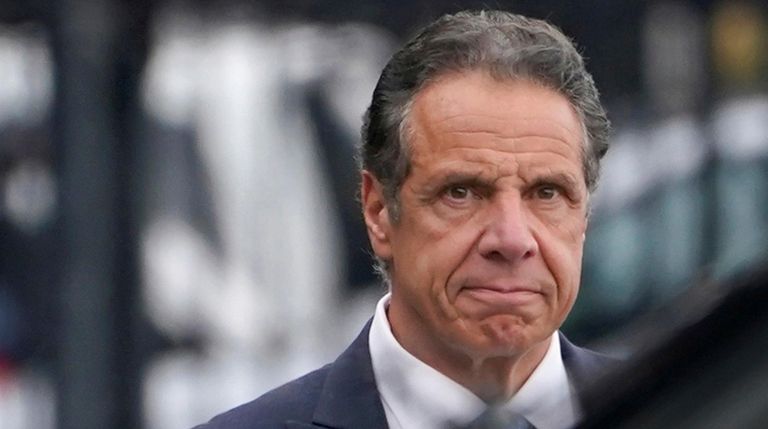 Gov. Andrew M. Cuomo prepares to board a helicopter after...