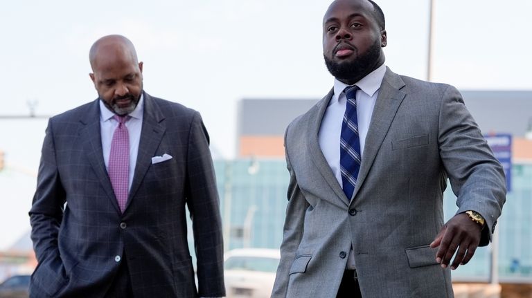 Former Memphis police officer Tadarrius Bean, right, arrives at the...