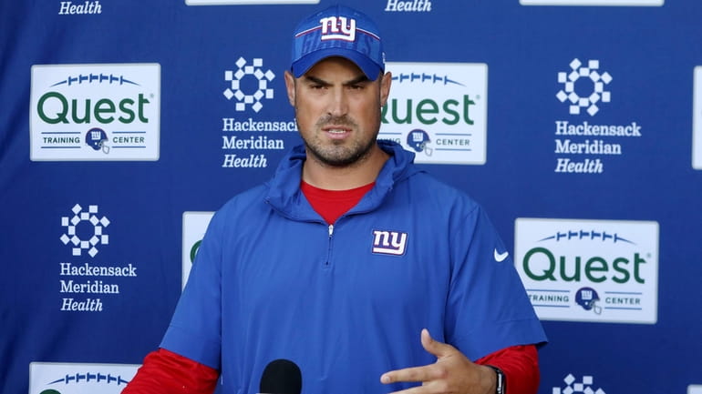 Giants offensive coordinator Mike Kafka speaks at the team's practice facility...