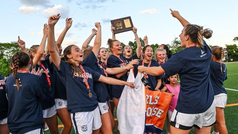 Cold Spring Harbor celebrates its victory over Carle Place at...