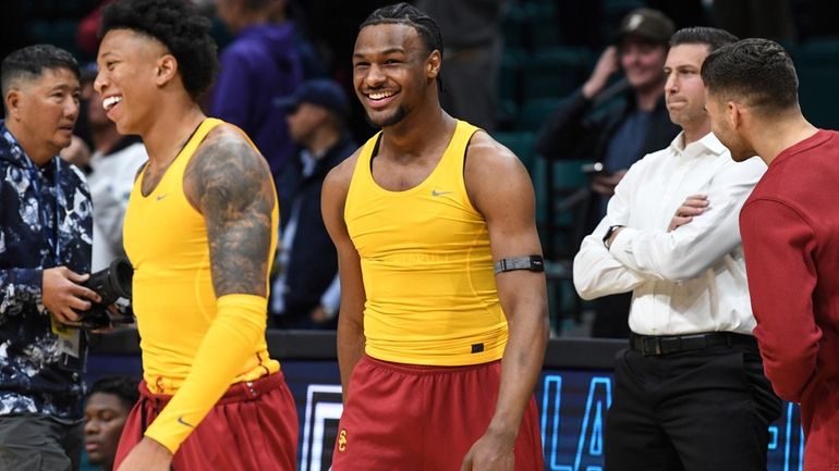 Southern California guard Bronny James warms up before an NCAA...