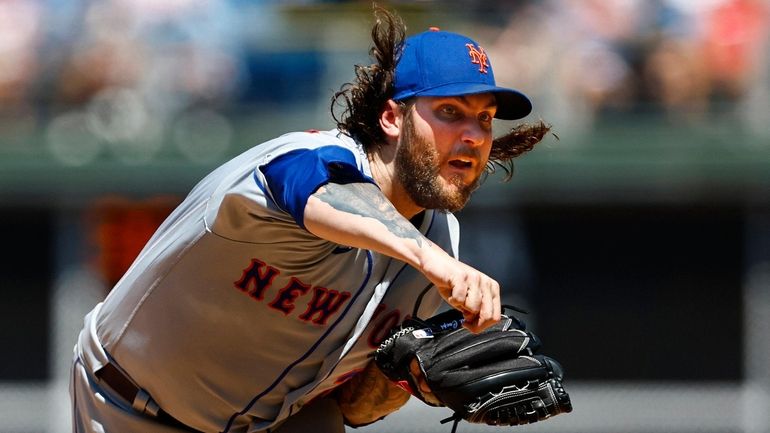 Mets pitcher Trevor Williams works against the Phillies during the...