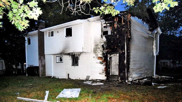 The district attorney says that this unoccupied home on Vanderbilt...