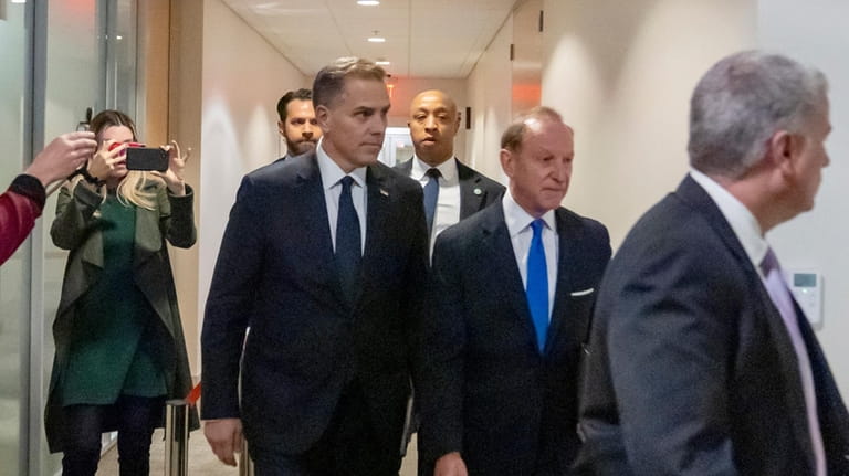 Hunter Biden, left, son of President Joe Biden, arrives with...