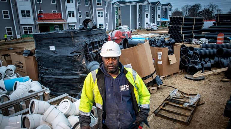 Aaron Vailes works at a construction site in Uniondale.