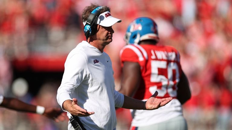 Mississippi head coach Lane Kiffin reacts to a touchdown during...