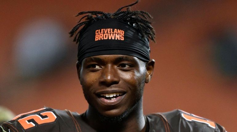 Cleveland Browns wide receiver Josh Gordon walks off the field...