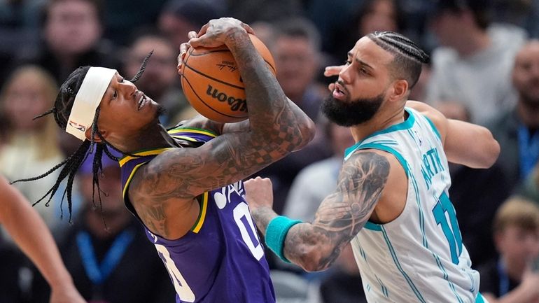 Charlotte Hornets forward Cody Martin (11) defends against Utah Jazz...