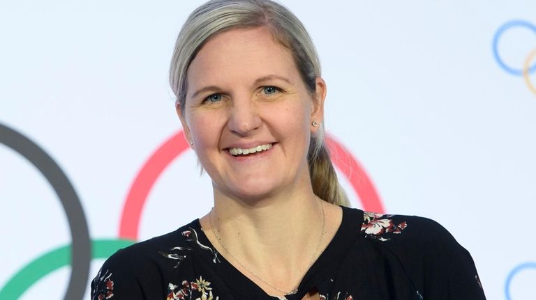 IOC member and former swimmer Kirsty Coventry smiles on the...