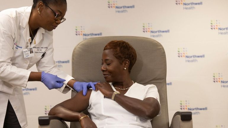 Registered nurse Sandra Lindsay, a vice president of public health advocacy...