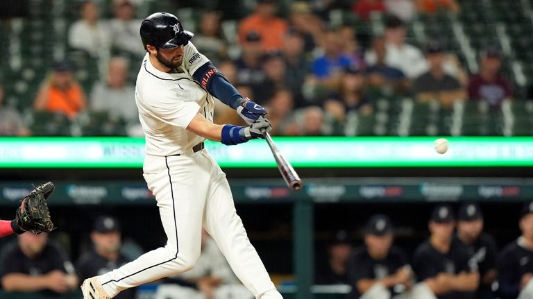 Detroit Tigers' Matt Vierling connects for a RBI double during...