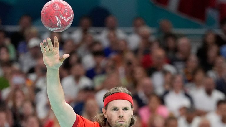 Denmark's Mikkel Hansen is in action during the gold medal...