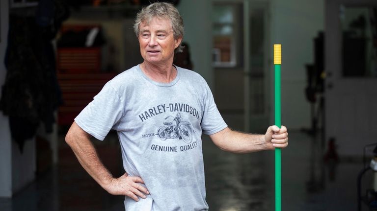 Gene Taylor clean up around his house in the historic...