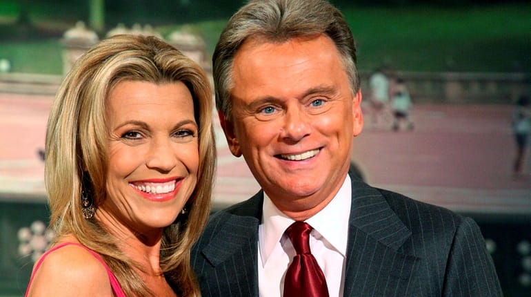 "Wheel of Fortune" host Pat Sajak, right, and co-host Vanna...