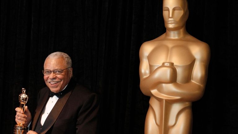 James Earl Jones poses with his honorary Oscar at the...