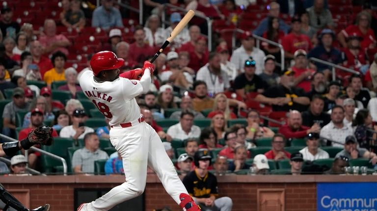 St. Louis Cardinals' Jordan Walker hits a three-run double during...