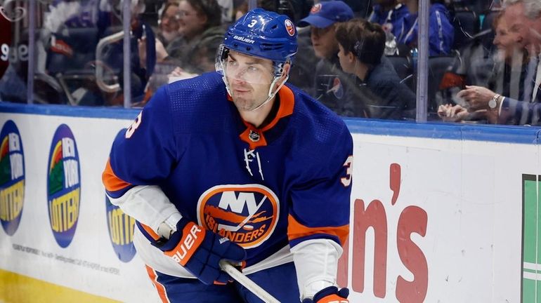 Adam Pelech #3 of the Islanders skates against the Colorado...