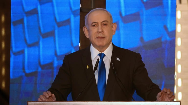 Israeli Prime Minister Benjamin Netanyahu addresses a ceremony marking Memorial...