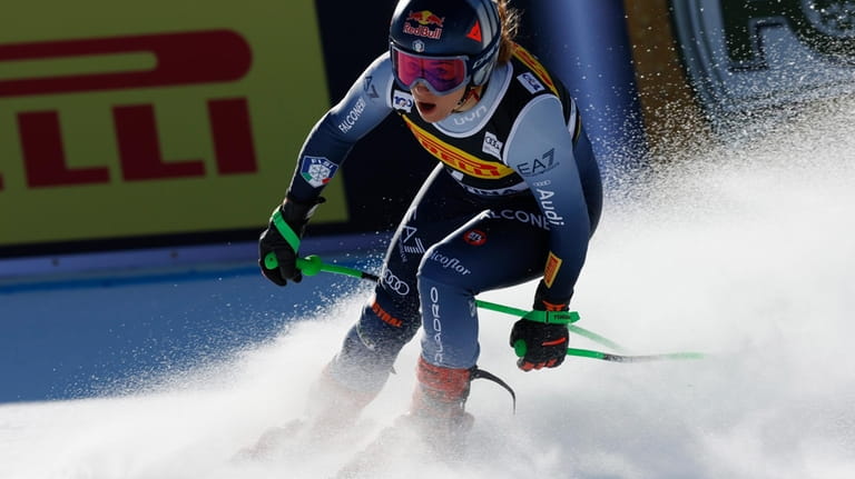 Italy's Sofia Goggia reacts after concluding an alpine ski, women's...
